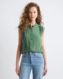 Sleeveless Mock-Neck Buttoned-Down Blouse with Ruffled Trim