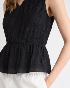 Sleeveless V-Neck Peplum Blouse